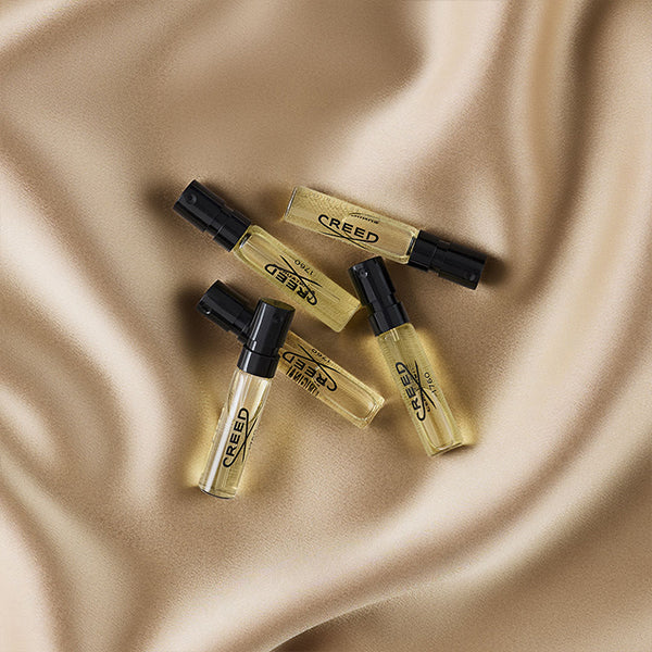 Five creed samples on gold silk