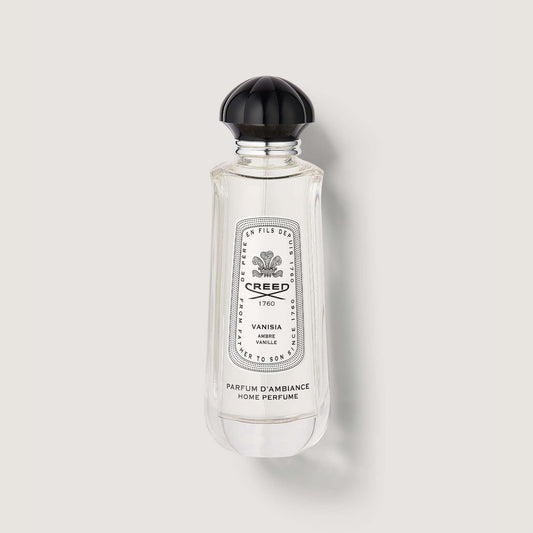 Clear glass Vanisia Room Spray bottle with black cap and engraved label - Front View | Creed Fragrances